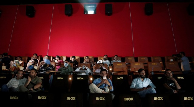A sparsely occupied cinema hall during a movie screening. (REUTERS/FILE) 