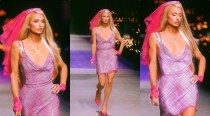 Paris Hilton gives bridal vibes in a sparkly pink dress as she walks the Versace runway