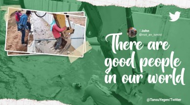 Dog rescue video, Dog saved by construction workers, Ecuador dog saved through digger by construction workers, Workers use JCB to save dog from drowning, viral dog rescue, Indian express