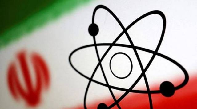 The atomic symbol and the Iranian flag are seen in this illustration, July 21, 2022. (Reuters)