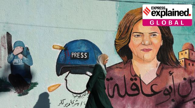 A mural of slain of Al Jazeera journalist Shireen Abu Akleh who was shot dead during an Israeli military raid in the West Bank town of Jenin, adorns a wall in Gaza City, May 15, 2022. (AP Photo/Adel Hana, File)