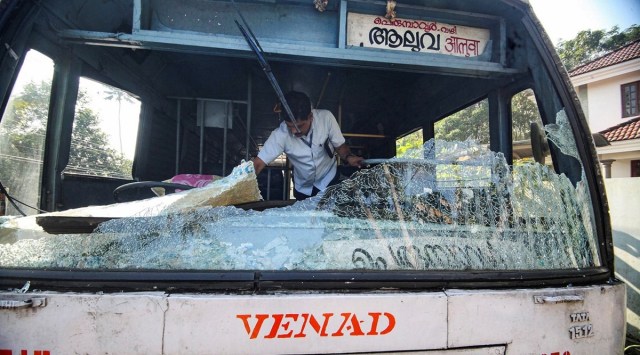 Broken windshield of a Kerala State Road Transport Corporation bus after some miscreants threw stones on it, during the 'hartal' called by Popular Front of India in protest against the nationwide arrest of its leaders by NIA and ED, in Kochi, September 23, 2022. (PTI)