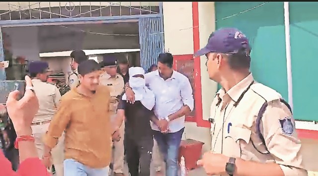 Shivprasad after being produced in court Friday. (Express Photo by Iram Siddique)