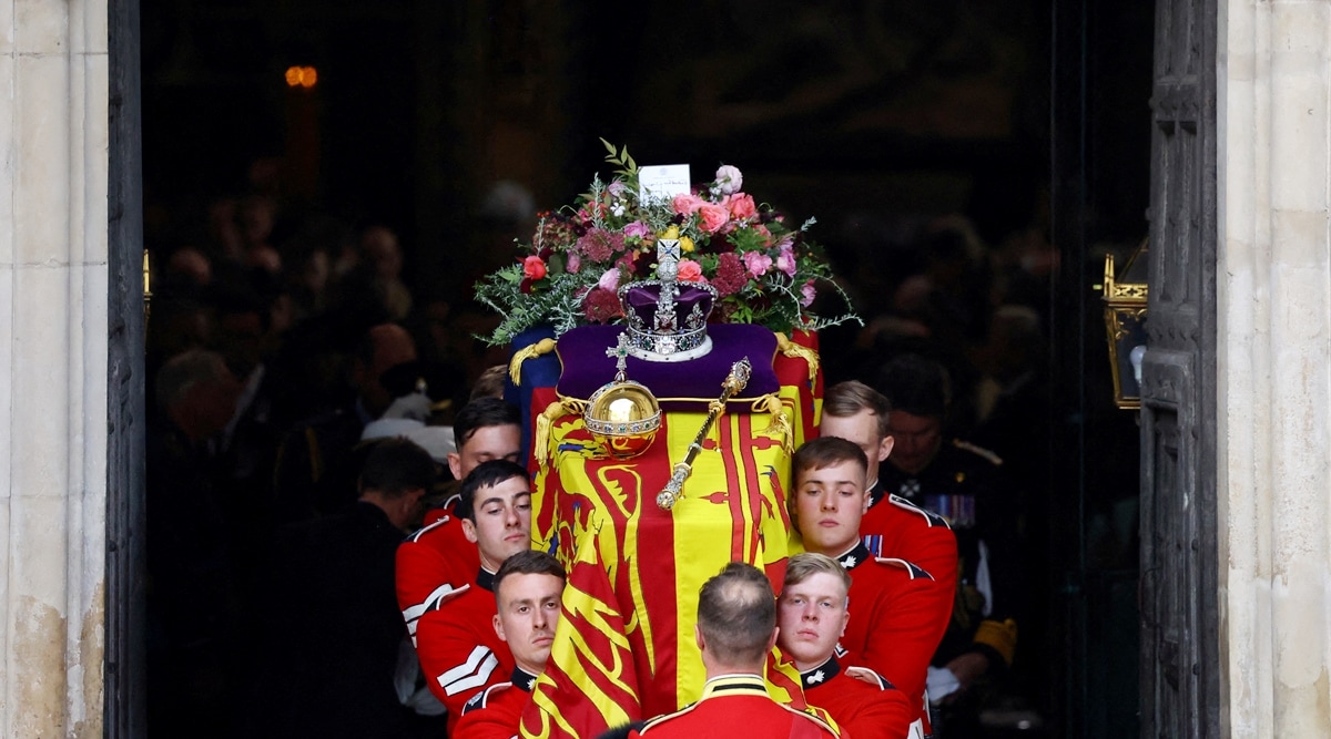 Royal funeral guests wear quiet tributes to the Queen