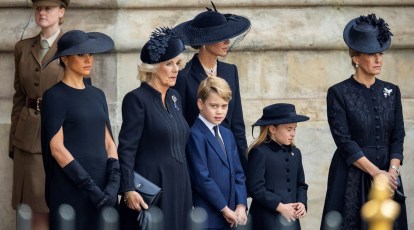 Royal funeral guests wear quiet tributes to the Queen