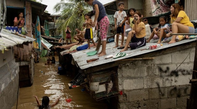 Vietnam downgrades Typhoon Noru to tropical storm, but warns of flood ...