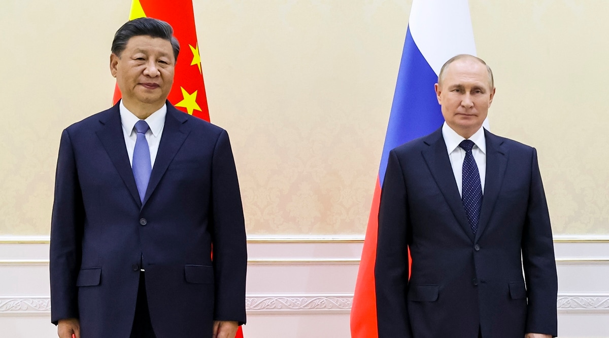 Chinese President Xi Jinping, left, and Russian President Vladimir Putin pose for a photo on the sidelines of the Shanghai Cooperation Organization (SCO) summit in Samarkand, Uzbekistan, Sept. 15, 2022. (Kremlin Pool Photo via AP)