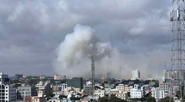 A view shows smoke rising following a car bomb explosion at Somalia's education ministry in Mogadishu, Somalia October 29, 2022 in this picture obtained from social media. (Abdihalim Bashir/via REUTERS)