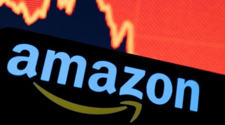 FILE PHOTO: Amazon logo is seen in front of a decreasing stock graph in this illustration taken April 29, 2022. (REUTERS/Dado Ruvic/Illustration/File Photo)