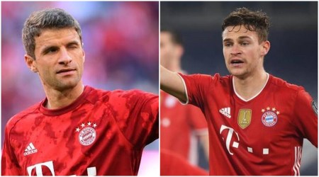 Bayern’s Thomas Mueller and Joshua Kimmich in isolation after posit...