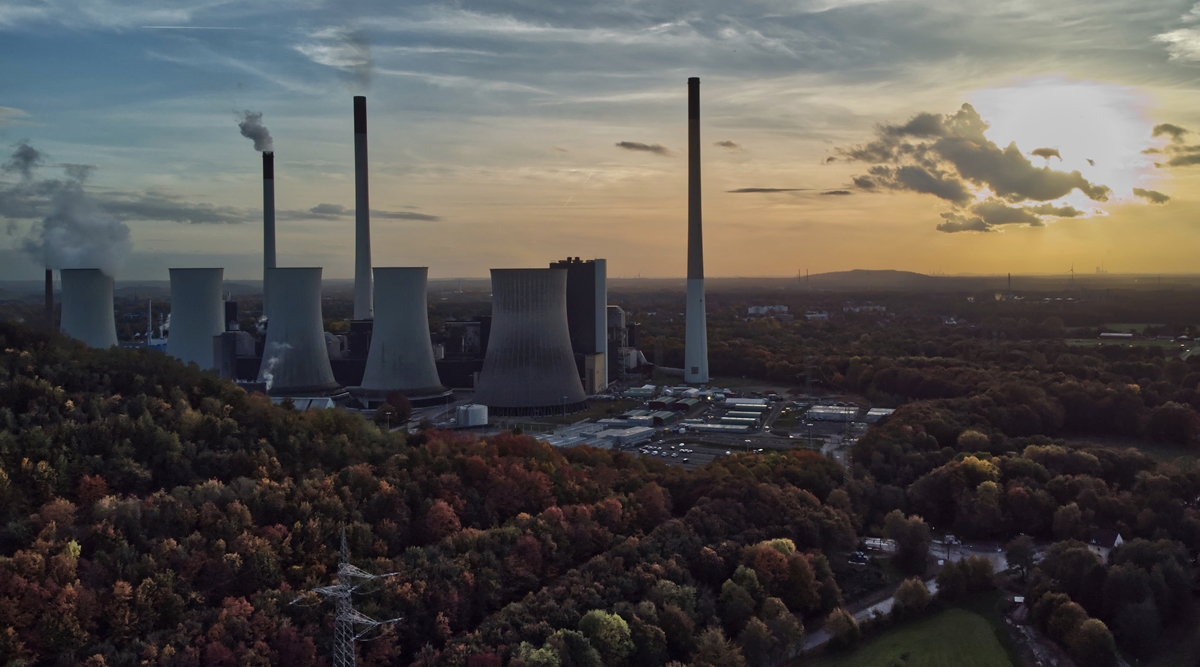The sun sets behind the cole-fired power plant 'Scholven' of the Uniper energy company in Gelsenkirchen, Germany, Oct. 22, 2022. (AP/File)