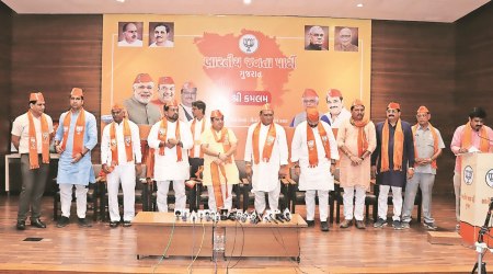 Harshad Ribadiya with BJP leaders at the party’s state headquarters in Gandhinagar on Thursday. (Image source: Twitter/BJP4Gujarat)