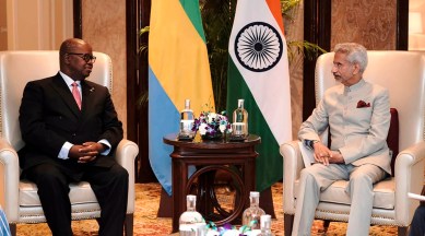 Foreign Minister of Gabon Michael Moussa-Adamo speak with Indian Foreign Minister S Jaishankar in the sidelines of a U.N. Counter-Terrorism Committee special meet in New Delhi, India, Saturday, Oct. 29, 2022. (Ministry of External Affairs via AP)