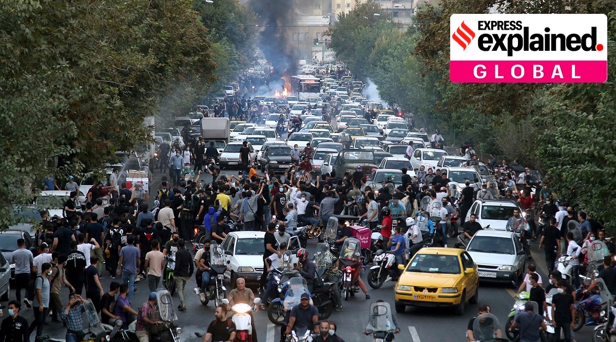 Protesters chant slogans during an agitation over the death of Mahsa Amini, who was detained by the morality police in Tehran. (AP Photo)