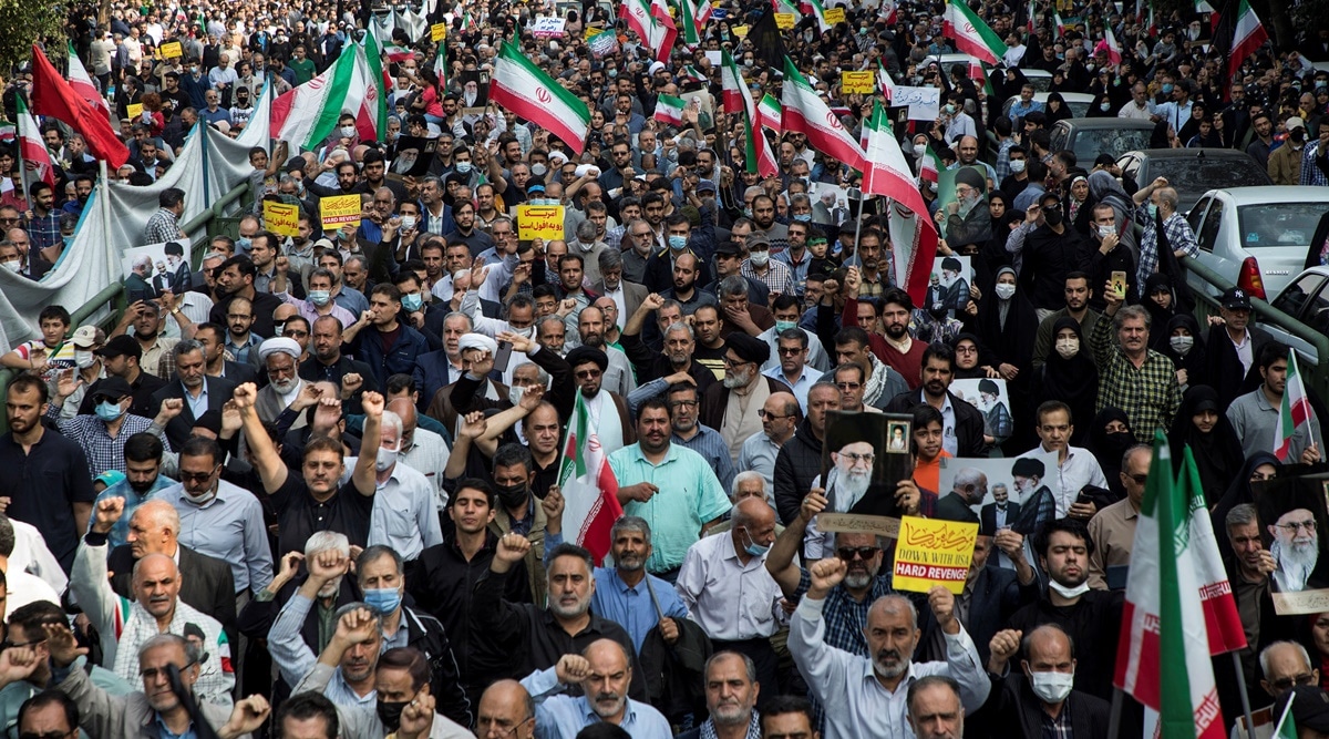 Iranians march during a protest condemning the Shiraz attack and unrest in Tehran, Iran October 28, 2022. WANA (West Asia News Agency via REUTERS) 