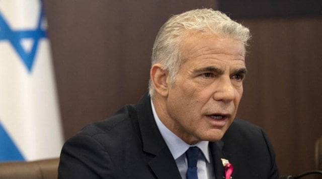 Israeli Prime Minister Yair Lapid makes an opening statement as he chairs the weekly cabinet meeting in Jerusalem, Oct. 2, 2022. Israel’s prime minister said Tuesday, Oct. 11, that the country has reached an “historic agreement” with neighboring Lebanon over their shared maritime border after months of U.S.-brokered negotiations. (AP) 