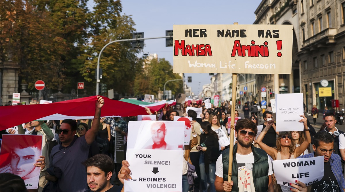 People take to the streets to protest over the death of a young woman in police custody in Iran, during a demonstration in Milan, Italy in October, 2022. (AP File Photo)