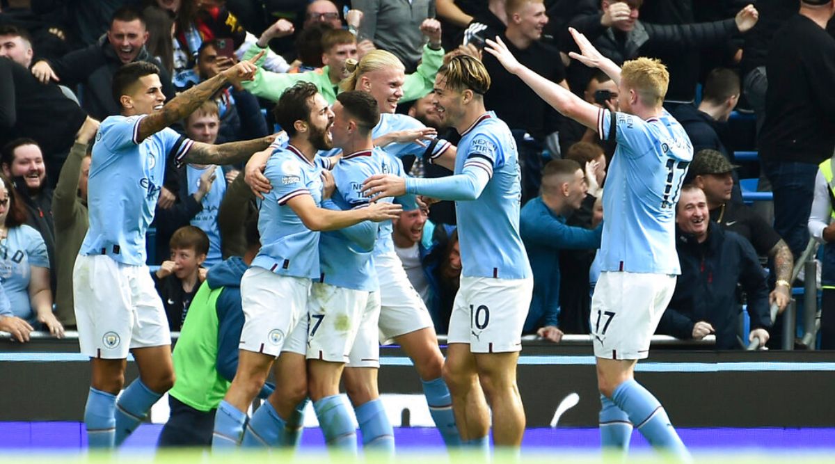 Man City and 10-man Liverpool leave it late to secure victories in