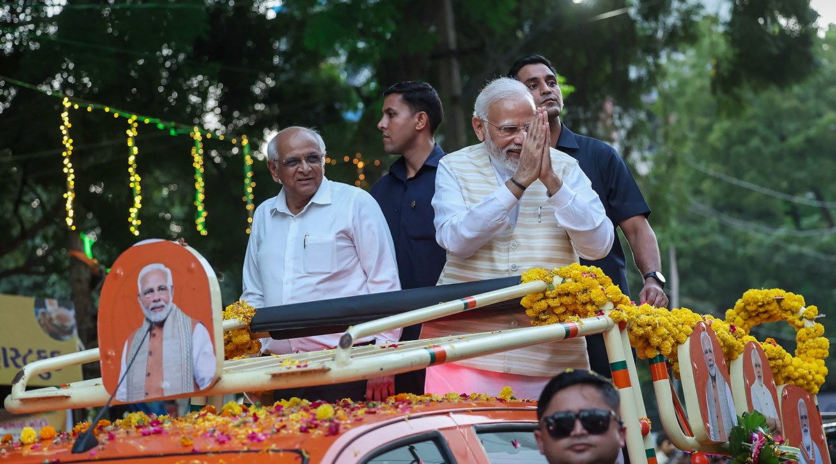 FILE-Prime Minister Narendra Modi on his arrival in Rajkot, Wednesday, Oct. 19, 2022. Gujarat CM  Bhupendra Patel is also seen. (PTI/File)
