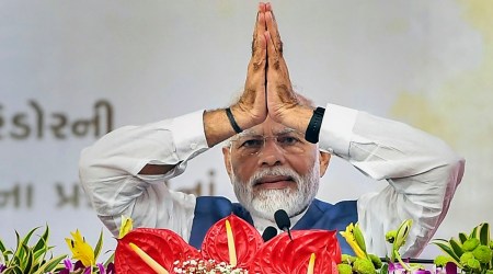 FILE-Prime Minister Narendra Modi speaks during the foundation stone laying ceremony of multiple development initiatives worth over Rs. 1970 crore at Vyara in Tapi district, Thursday, Oct. 20, 2022. (PTI Photo)