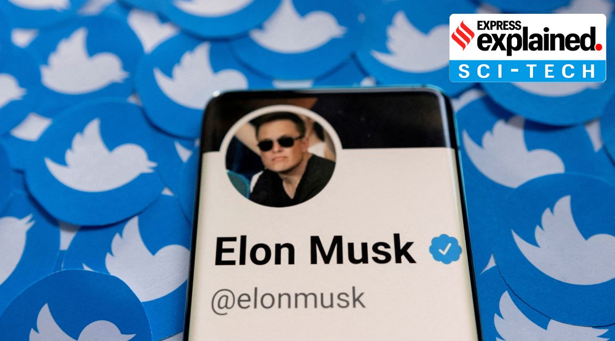 Elon Musk's Twitter profile is seen on a smartphone placed on printed Twitter logos in this picture illustration taken April 28, 2022. (Reuters: Dado Ruvic)