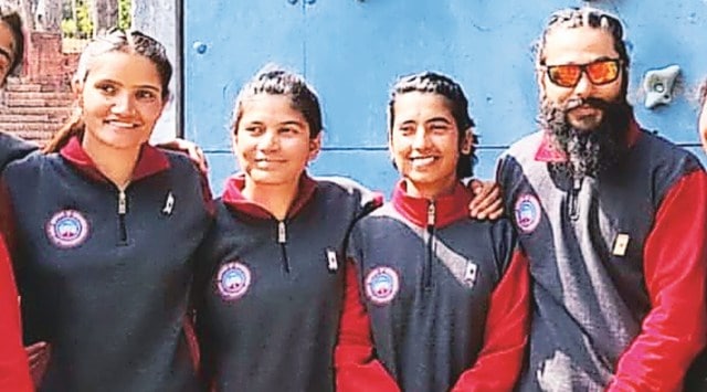 Avalanche victim NIM instructor, Naumi Rawat (far left) and Aditya Gaur (far right) at NIM, Uttarkashi,  in March 2022. (Express Photo)