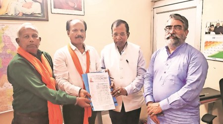 Community members with memorandum. Express