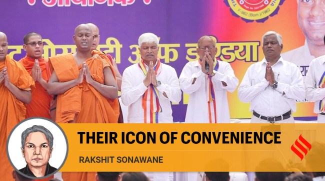 Rajendra Pal Gautam (3rd from left) is seen at the ‘Deeksha Samaroh’ held in Delhi repeating the vows with close to 10,000 people who accepted Buddhism. (Twitter/@AdvRajendraPal)