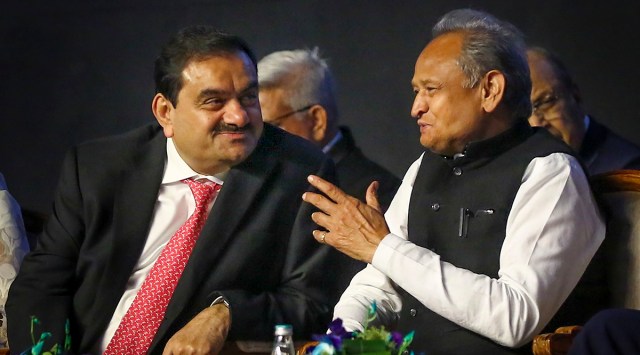 Rajashtan CM Ashok Gehlot and Adani Group Chairman Gautam Adani during the Invest Rajasthan Summit 2022, in Jaipur, Friday, Oct. 7, 2022. (PTI)