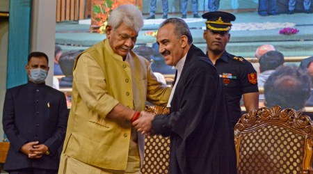Jammu and Kashmir Lt. Governor Manoj Sinha with Justice Ali Mohammad Magrey during the latter's oath-taking ceremony as Chief Justice of Jammu and Kashmir and Ladakh High Court, in Srinagar, Thursday, Oct. 13, 2022. (PTI)