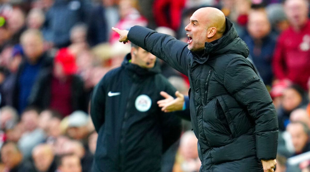 pep-guardiola-says-liverpool-fans-threw-coins-at-him