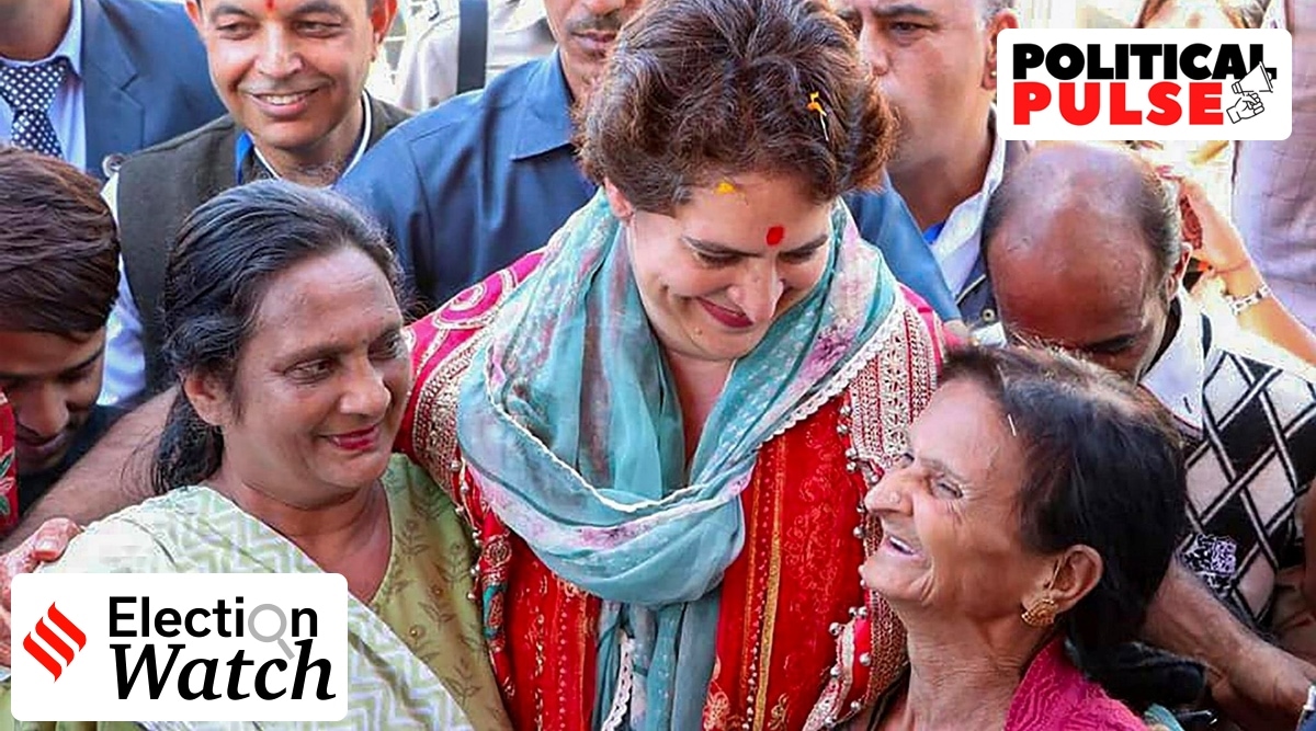AICC general secretary Priyanka Gandhi Vadra with party workers upon her arrival to attend the party's 'Parivartan Pratigya Rally', in Solan, October 14, 2022. (PTI)
