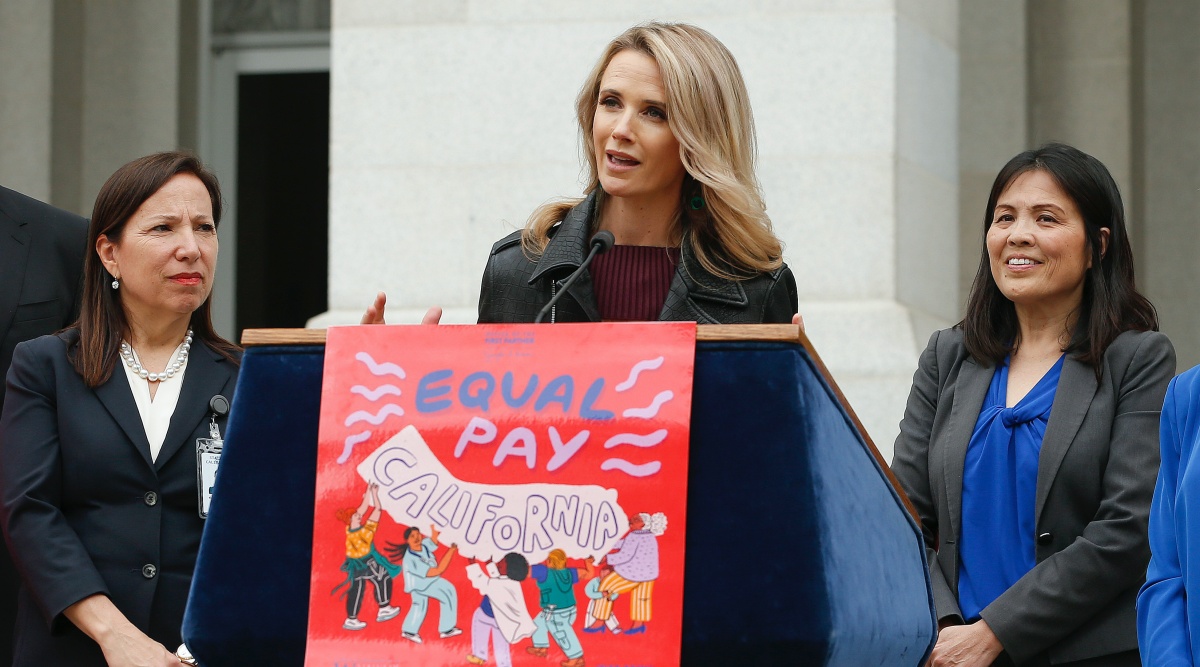 California first partner Jennifer Siebel Newsom, center, wife of Gov. Gavin Newsom, joined others to announce the #EqualPayCA campaign, in Sacramento. (AP Photo/Rich Pedroncelli)