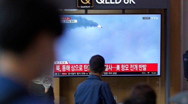 A TV screen showing a news program reporting about North Korea's missile launch with file footage, is seen at the Seoul Railway Station in Seoul, South Korea, Thursday, Oct. 6, 2022. North Korea launched two ballistic missiles toward its eastern waters on Thursday, as the United States redeployed one of its aircraft carriers near the Korean Peninsula in response to the North's recent launch of a powerful missile over Japan. (AP Photo)