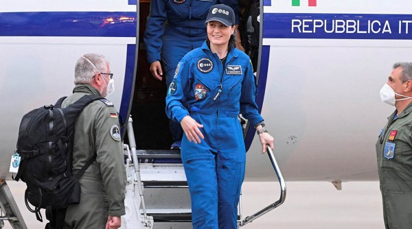 Italian ESA astronaut Samantha Cristoforetti disembarks a plane upon her arrival at the Cologne-Bonn airport following her mission and so-called "Direct Return" from the International Space Station