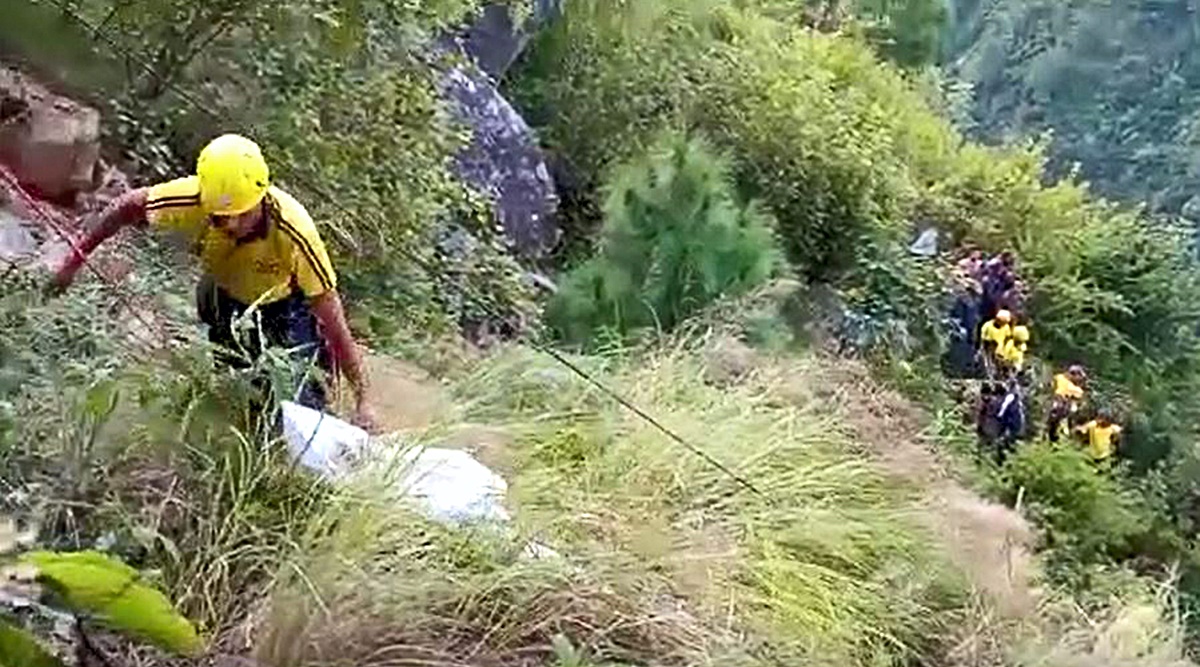 Rescue operation underway after a bus carrying members of a marriage party fell into a gorge, in Pauri Garhwal district. (PTI)