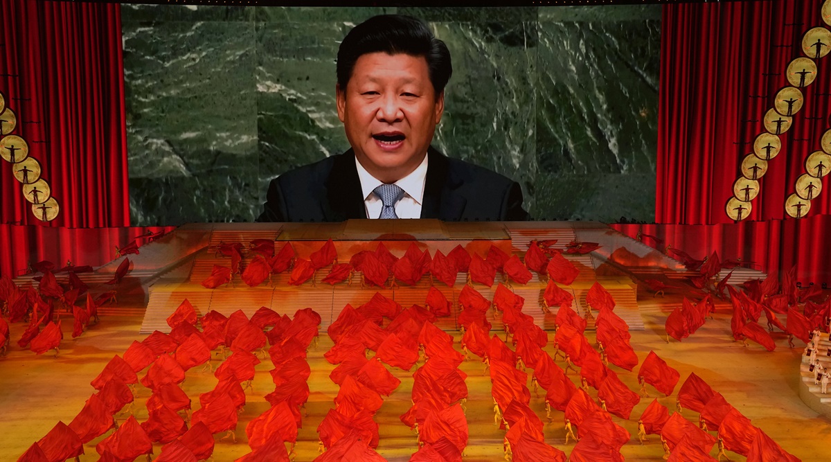 FILE - Chinese President Xi Jinping is displayed on a screen as performers dance at a gala show ahead of the 100th anniversary of the founding of the Chinese Communist Party in Beijing on June 28, 2021. Chinese President Xi Jinping was the son of a communist revolutionary leader, a victim of the Cultural Revolution and a provincial leader who promoted economic growth before ascending to the very top a decade ago. (AP Photo/Ng Han Guan, File)