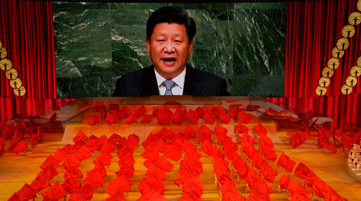 FILE - Chinese President Xi Jinping is displayed on a screen as performers dance at a gala show ahead of the 100th anniversary of the founding of the Chinese Communist Party in Beijing on June 28, 2021. Chinese President Xi Jinping was the son of a communist revolutionary leader, a victim of the Cultural Revolution and a provincial leader who promoted economic growth before ascending to the very top a decade ago. (AP Photo/Ng Han Guan, File)