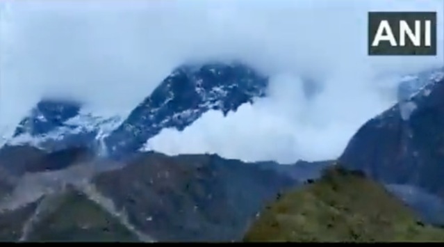 A massive avalanche hits the mountains surrounding the Kedarnath Shrine in Uttarakhand. (Screenshot: ANI)