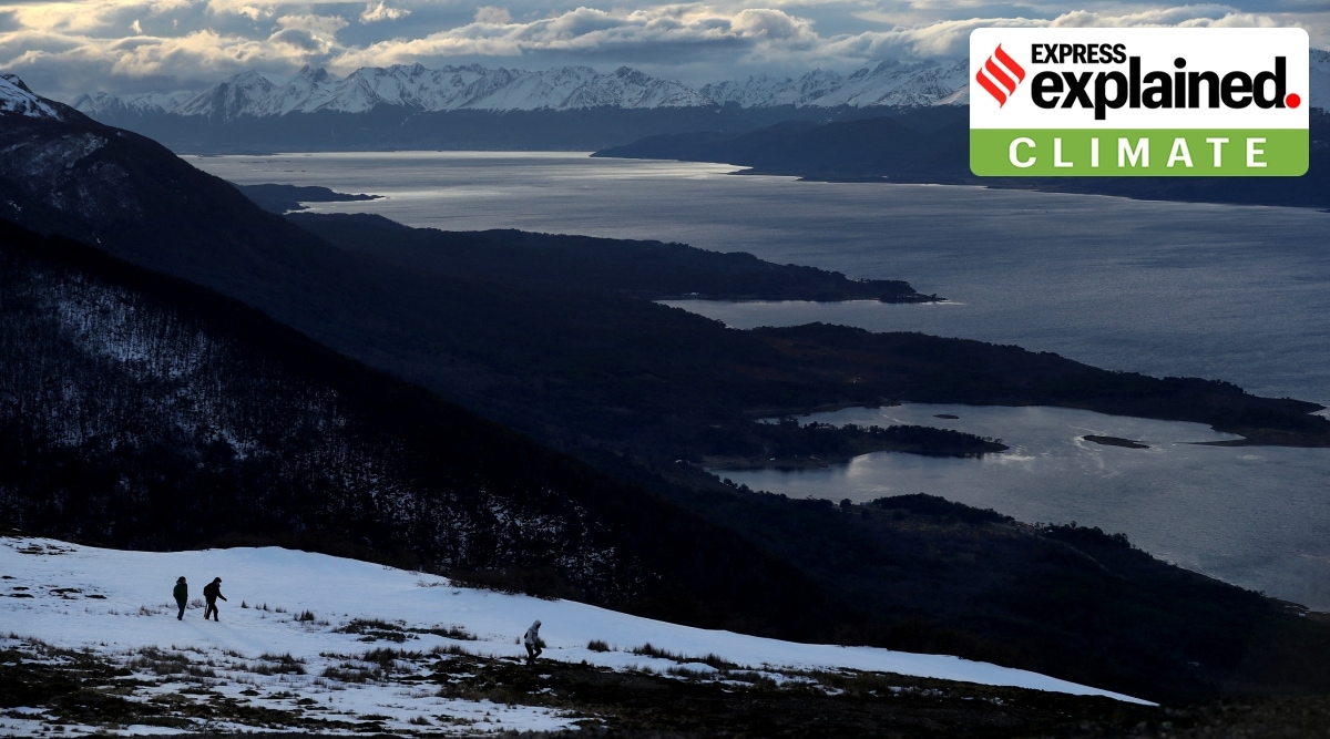 Scientists walk on Bandera hill in front of Beagle channel, Cabo de Hornos area, at Navarino island, Magallanes and Chilean Antarctic Region, close to Puerto Williams town, Chile, September 24, 2022. (REUTERS)
