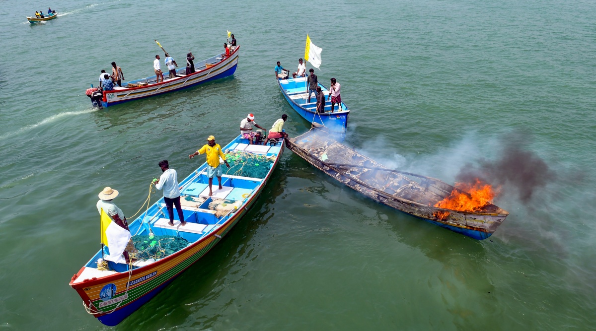 vizhinjam-stir-fishermen-set-ablaze-boat-throw-police-barricade-into-sea