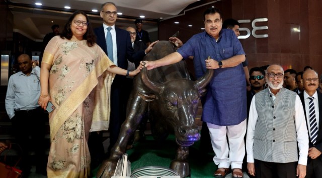 Union Minister Nitin Gadkari at BSE for the listing of convertible debentures and bell ringing ceremony of National Highway Infra Trust in Mumbai on Friday. (Express Photo by Amit Chakravarty)