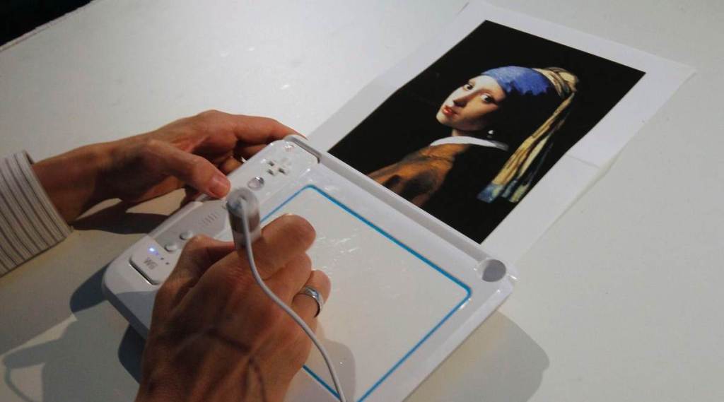 Activist glues his head to ‘Girl with a Pearl Earring’ painting in The