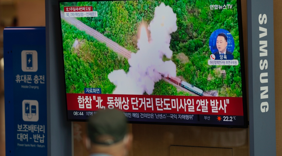 A TV screen showing a news program reporting about North Korea's missile launch with file footage, is seen at the Seoul Railway Station in Seoul, South Korea, Saturday, Oct. 1, 2022. (AP Photo)