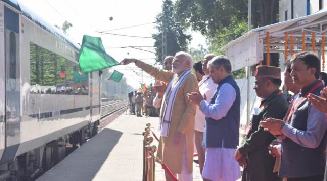  Prime Minister Narendra Modi flags off Vande Bharat Express train from Una, Thursday, Oct. 13, 2022. Railways Minister Ashwini Vaishnaw and Union Minister Anurag Thakur are also seen. (Express Photo)