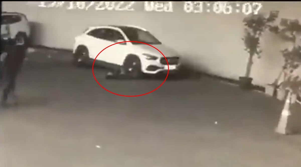 A screenshot of the CCTV footage of the incident, showing Yasmin Mishra's legs getting stuck under the front wheels of the car. (ANI)