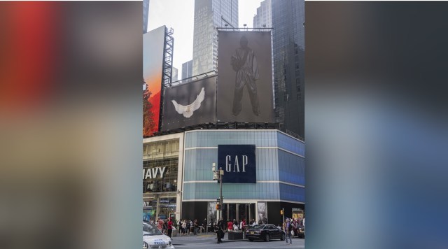 People lined up outside the Gap store for the brand’s Yeezy collaboration in Times Square, New York, on July 21, 2022. (Hiroko Masuike/The New York Times)
