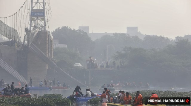 Rescue operation in progress at Morbi suspension bridge collapse site. (Express photo by Nirmal Harindran)