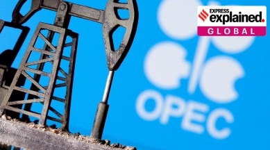 A 3D-printed oil pump jack in front of the OPEC logo in this illustration picture.