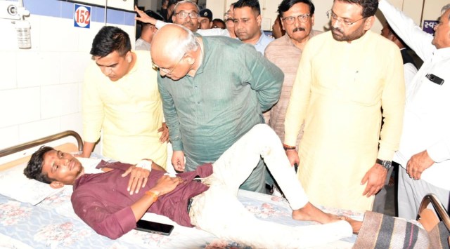 Chief Minister Bhupendra Patel and MoS Home Harsh Sanghavi, at the Morbi Civil hospital meeting survivors of the Jhoolta Pul collapse incident. (Express)